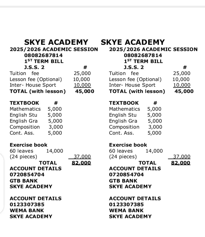 Robotics club students programming competition robot in tech workshop