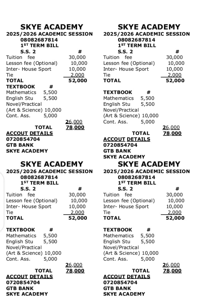 Robotics club students programming competition robot in tech workshop